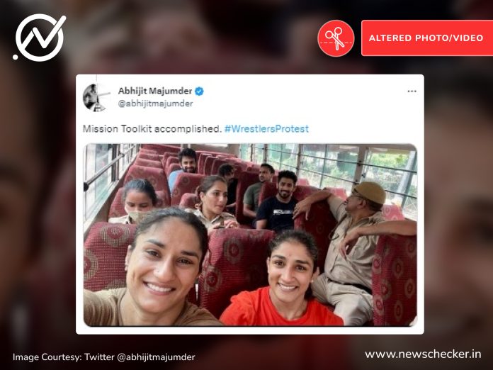 The viral photo of a smiling Vinesh Phogat and Sangeeta Phogat from inside a police van after they were detained was found to be altered using an AI app.